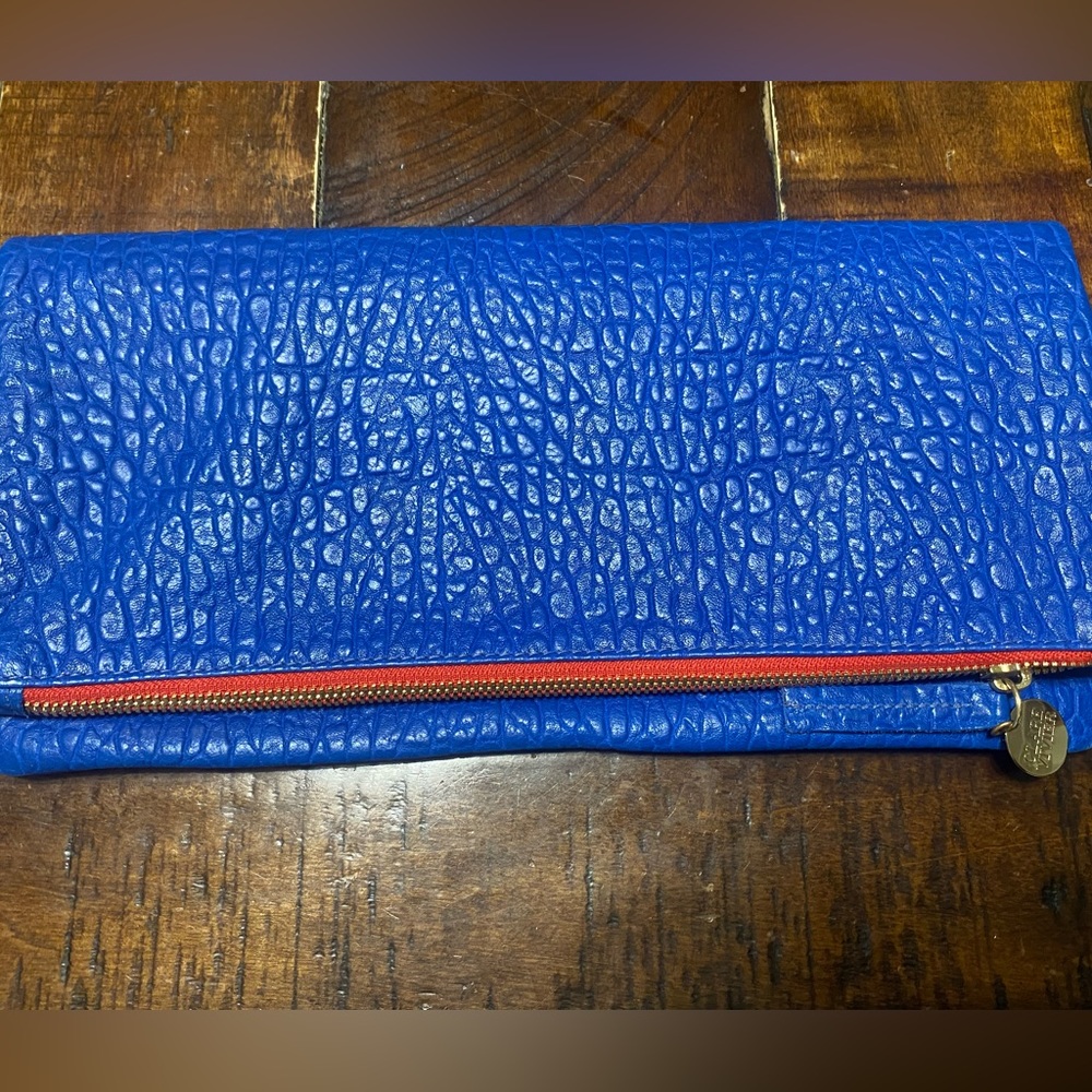 Clare V. Blue clutch